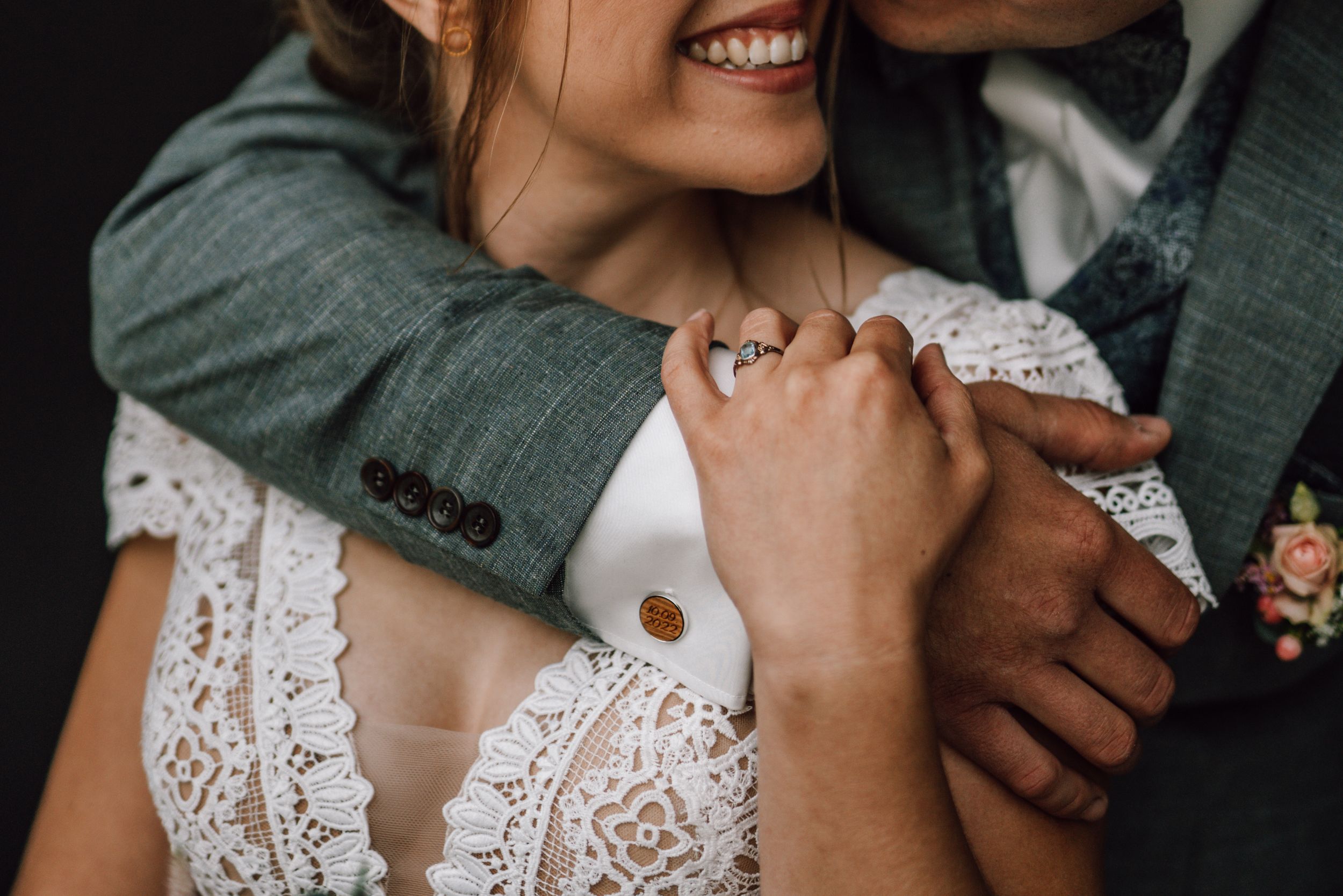 Close-up wedding portrait capturing genuine laughter and joy.