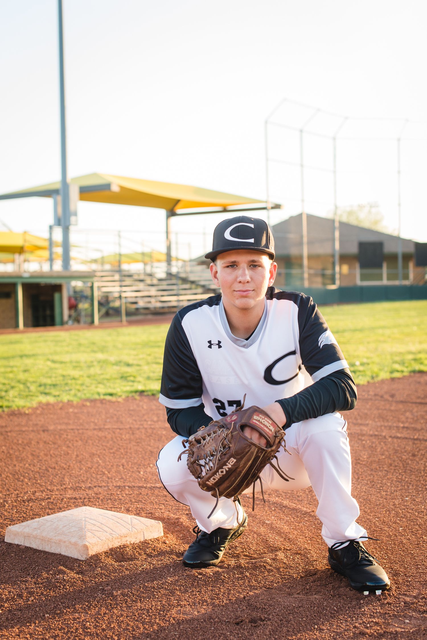 Campus Haysville high school senior pictures at baseball field - Derby, Wichita, KS photographer