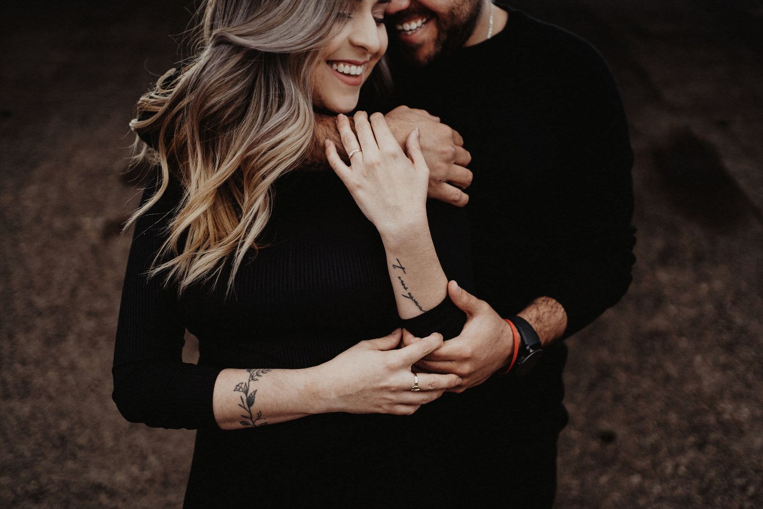 Vancouver Wedding Photographer Chris Cassio and LG hugging a couple hugging from behind in color