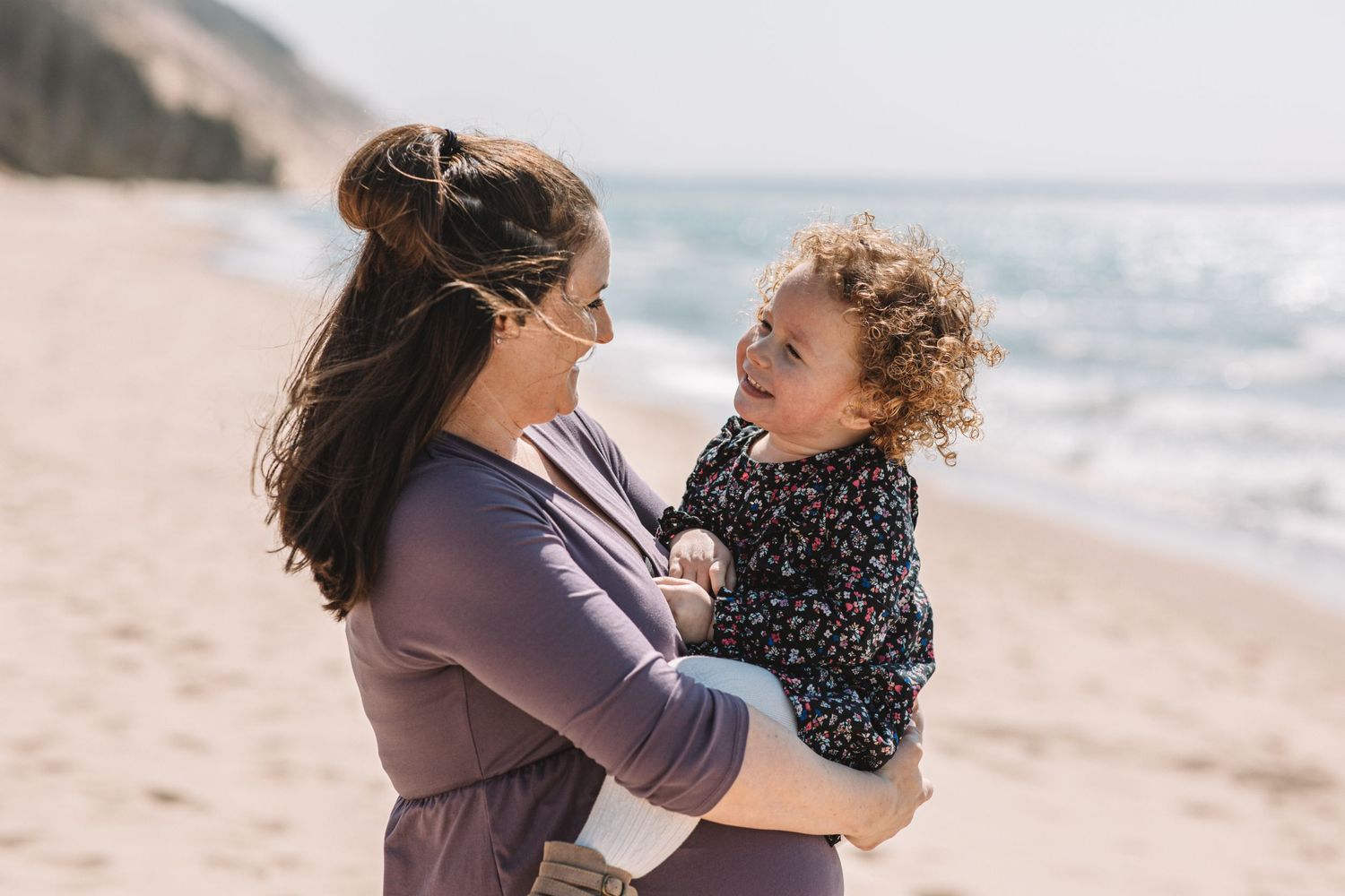 Mother and daughter on beach in Traverse City