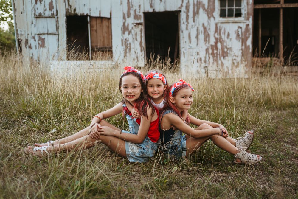 Young friends playing and having fun together in an outdoor setting.