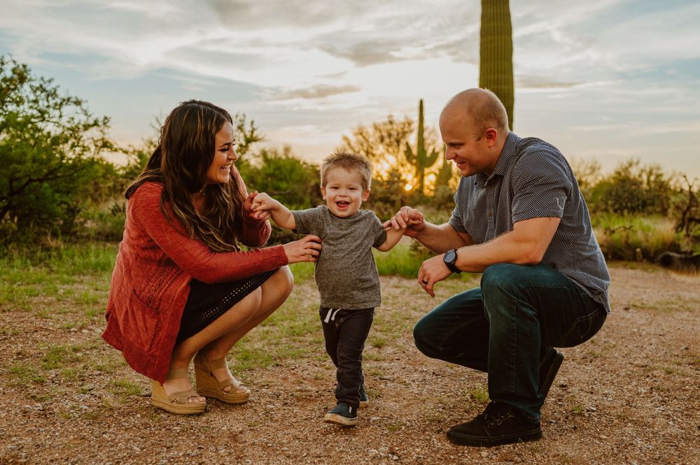 Playful interactions on a desert trail during golden hour.