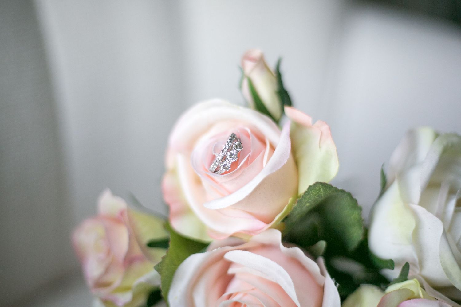 ring and roses at intimate wedding