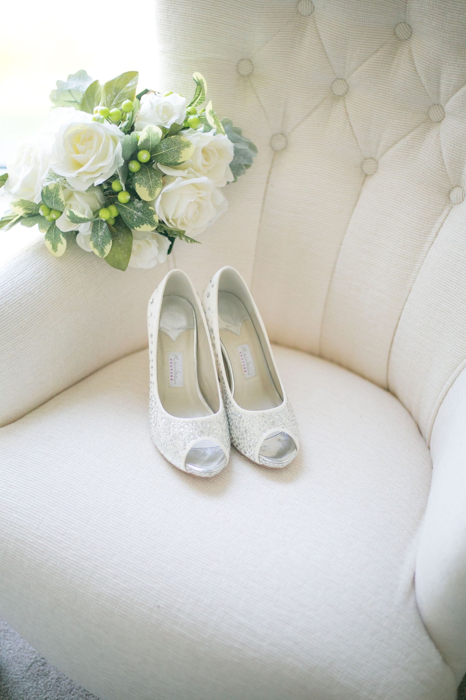 wedding shoes and flowers at intimate wedding
