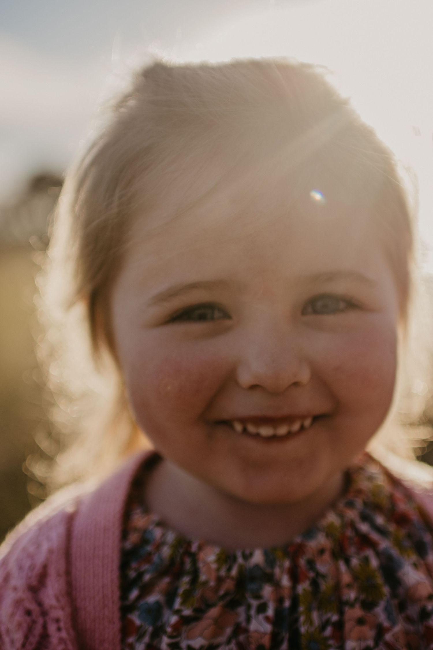 smiling girl in the golden haze