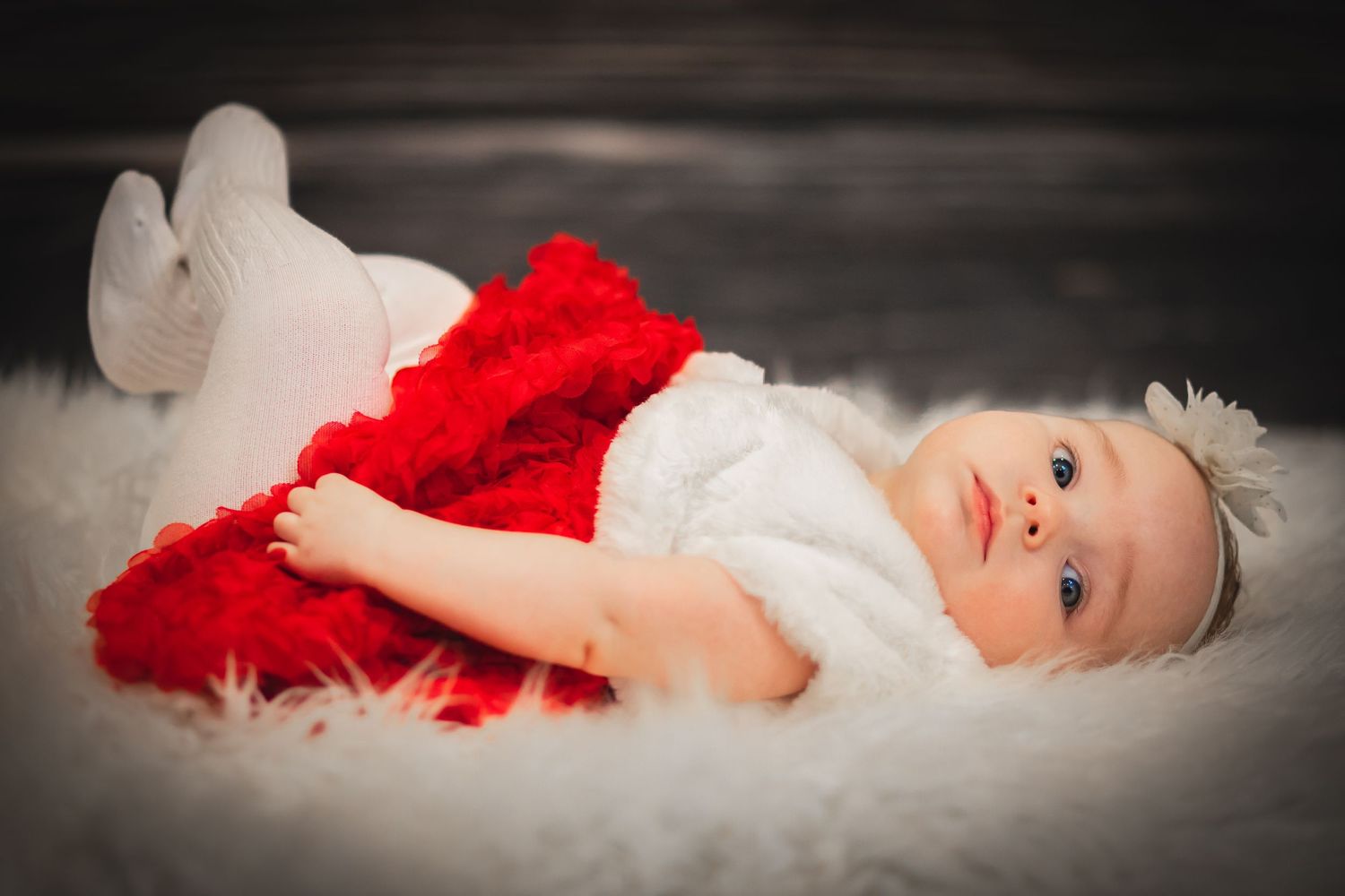 adorable baby girl dressed in holiday best