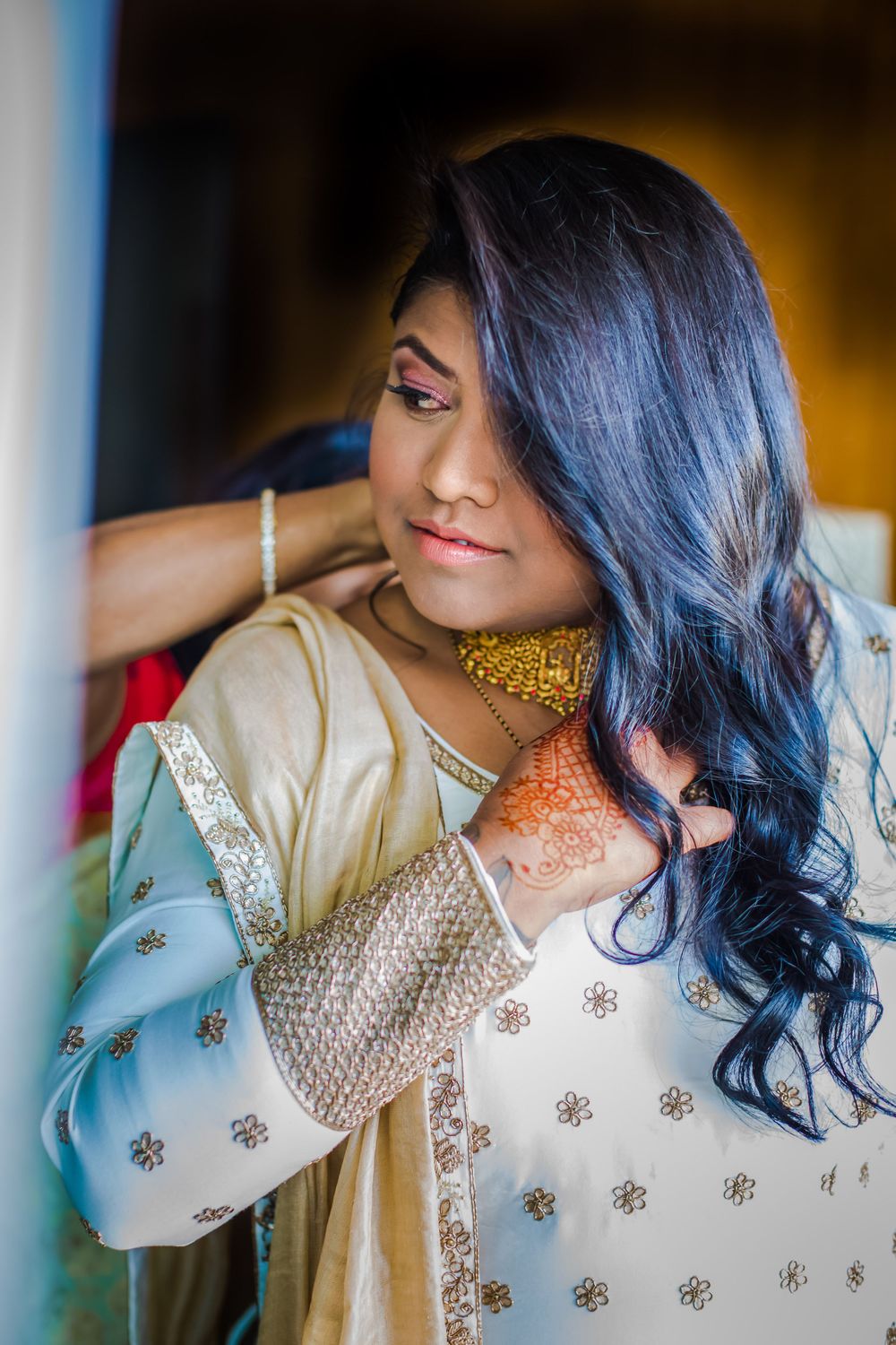 Indian bride getting ready before wedding