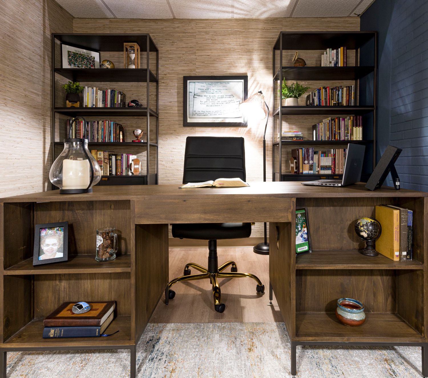 Custom built-in wooden desk with symmetrical shelving and office chair in home workspace. Interior Design, NJ Photo