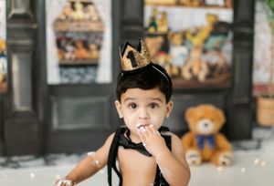 Teddy bear themed retail store with vintage decor and multiple stuffed animals on display.