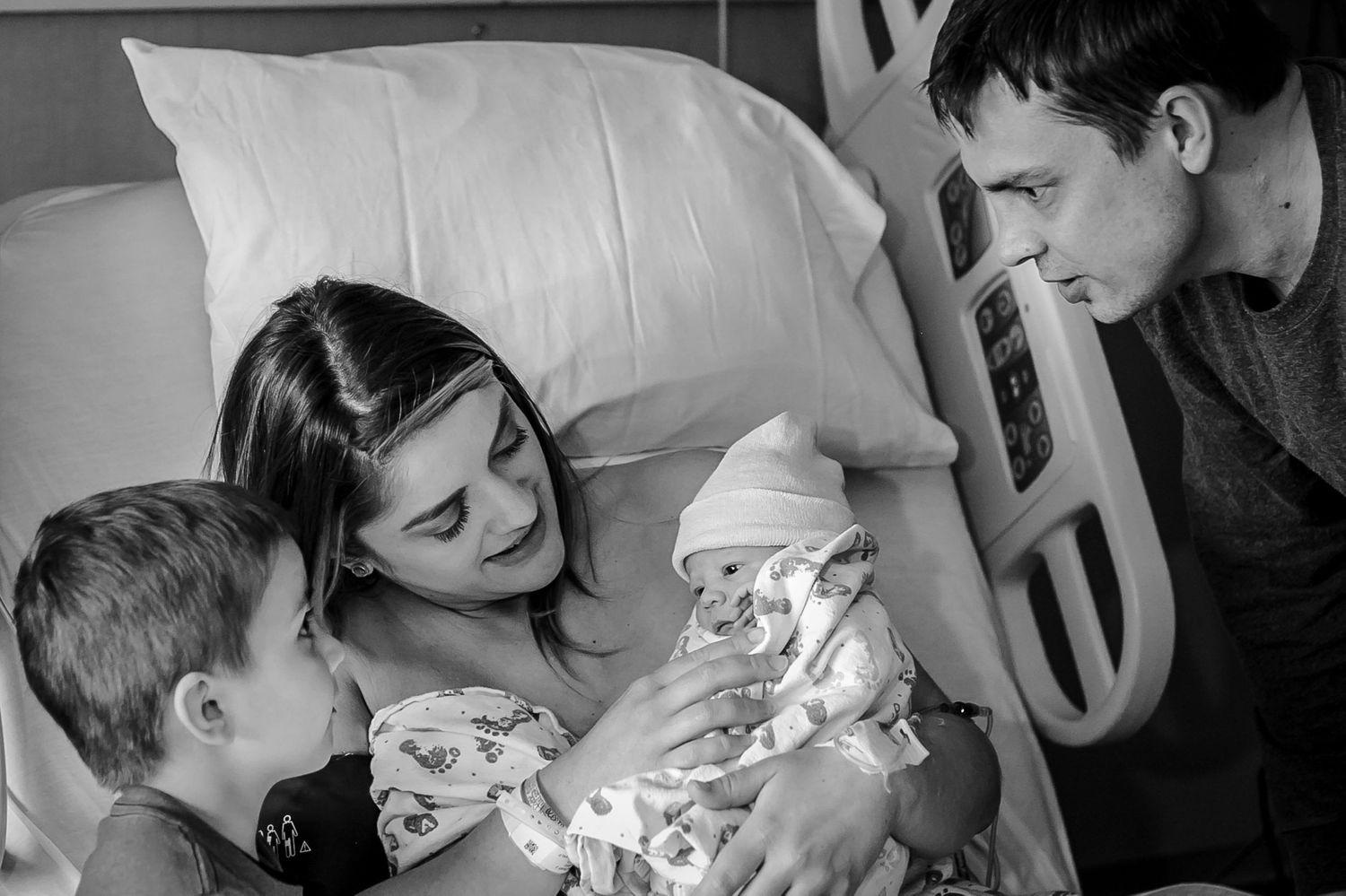 Big brother meeting his little brother, who is being held by mom just after birth at UnityPoint Health in Sioux City.