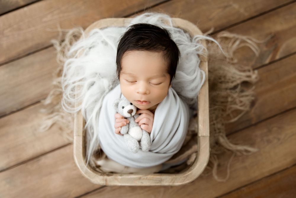 Crystal Cage newborn prop pose, baby boy. Huntley IL newborn photos