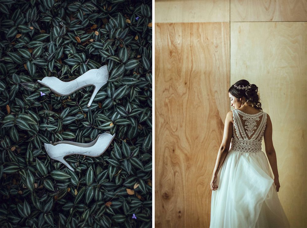 White bridal shoes on foliage and wedding dress with detailed back design.