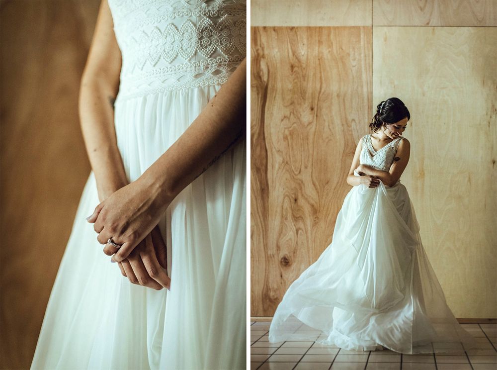 Wedding dress details showing delicate lace bodice and flowing skirt movement.