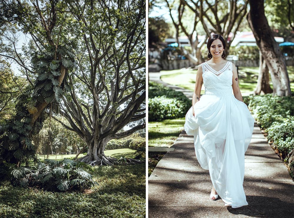 Garden wedding scene with dramatic tree and flowing white dress.