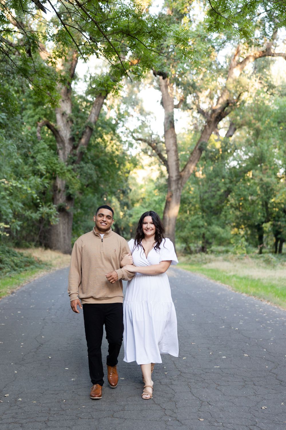 Couple walking on road in Bidwell Park at one mile recreation area Chico, California