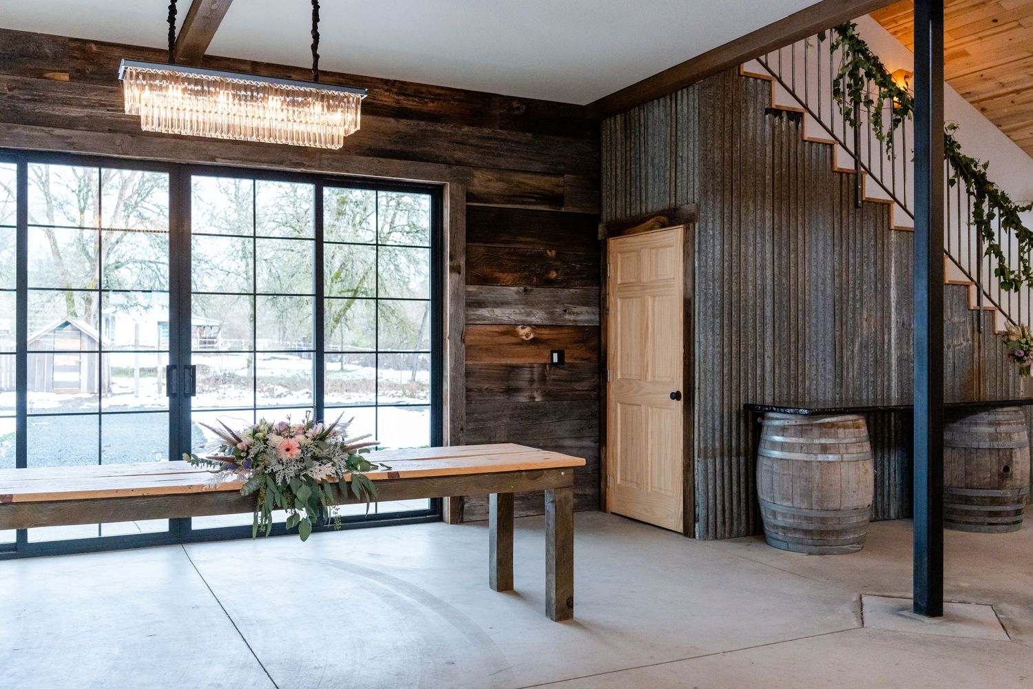 barn hall with floral table piece on the table