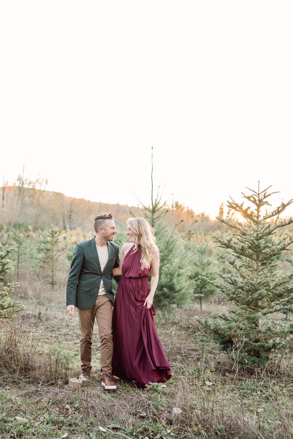 couple at sunset tree farm love and fun light and airy photographer c photography