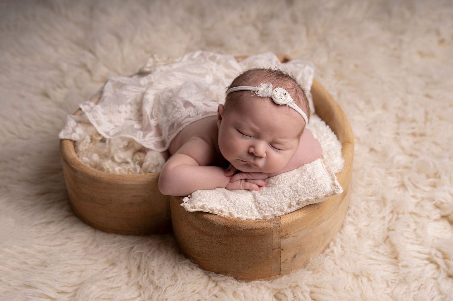 posed safely in a heart prop and styled simple and clean
