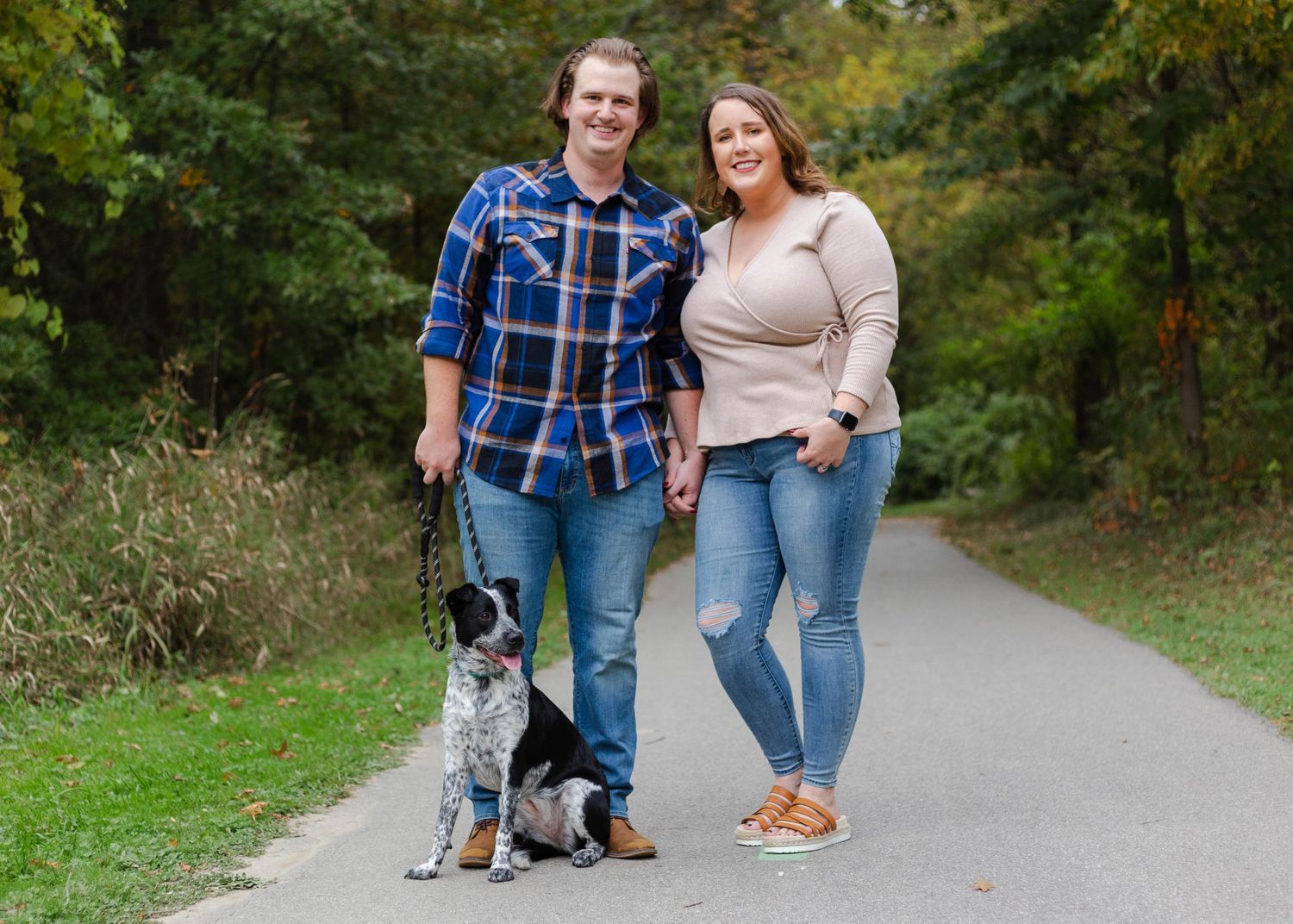a couple with their dog