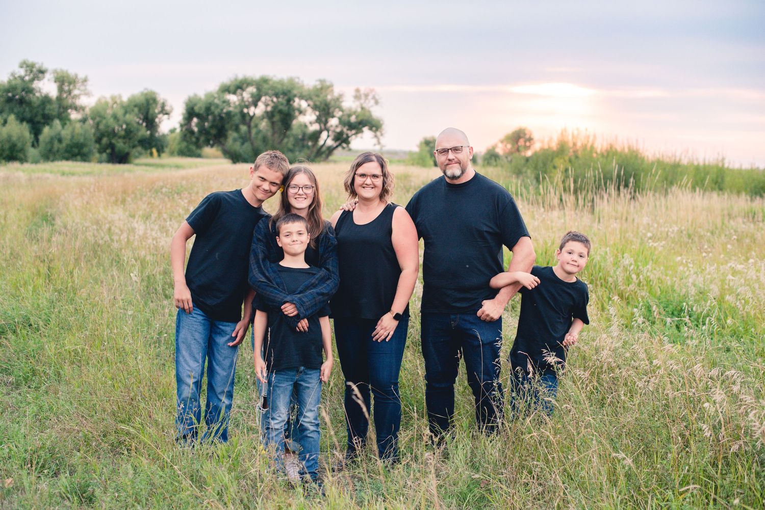Standing Family photo in grass Steinbach