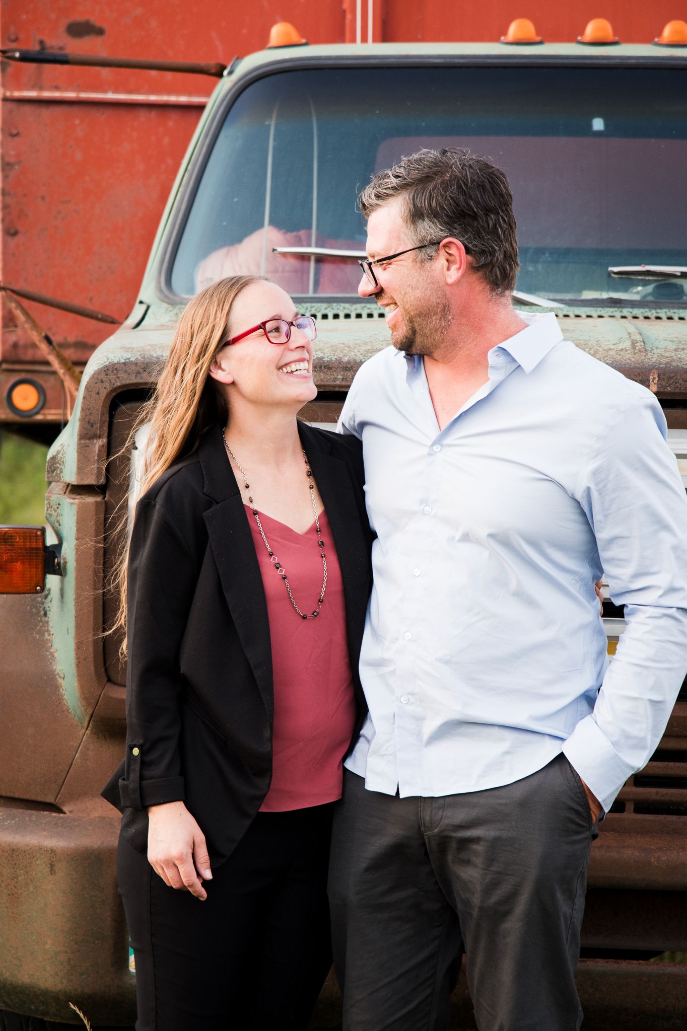Couple in front of a vintage Truck