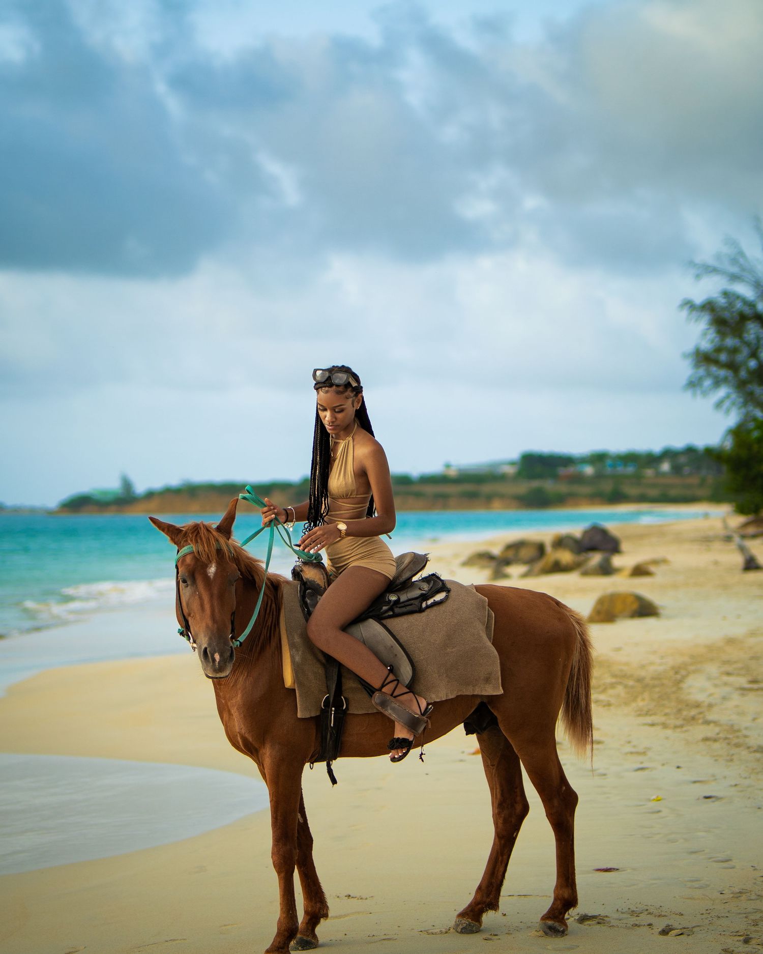 Woman horseback riding on the beach — luxury travel portrait by Timoy B Photography in Antigua.