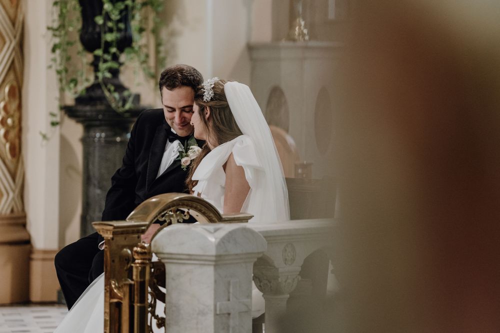 Bride and groom outside a Catholic church