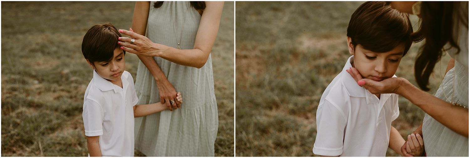 Tender moment captured between parent and child outdoors in natural lighting.