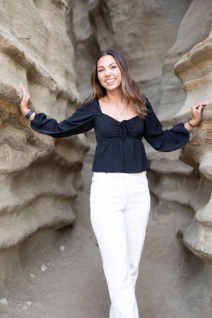 High school senior girl session next to rock formation in San Clemente