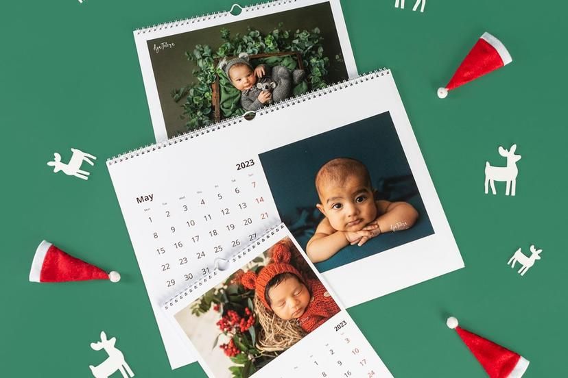 Holiday-themed photo calendar with festive decorations on green background.