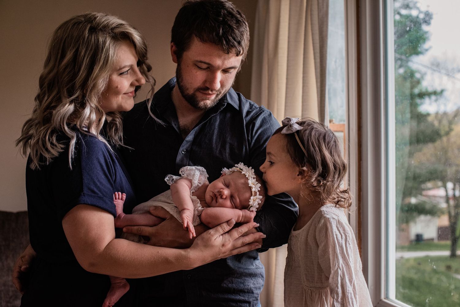 new parents and big sister enjoy their newest addition in buckhannon, WV