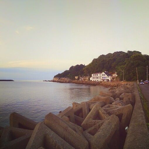 Looking back towards BuraBura House along the bay in the small town of Mogimachi, Japan