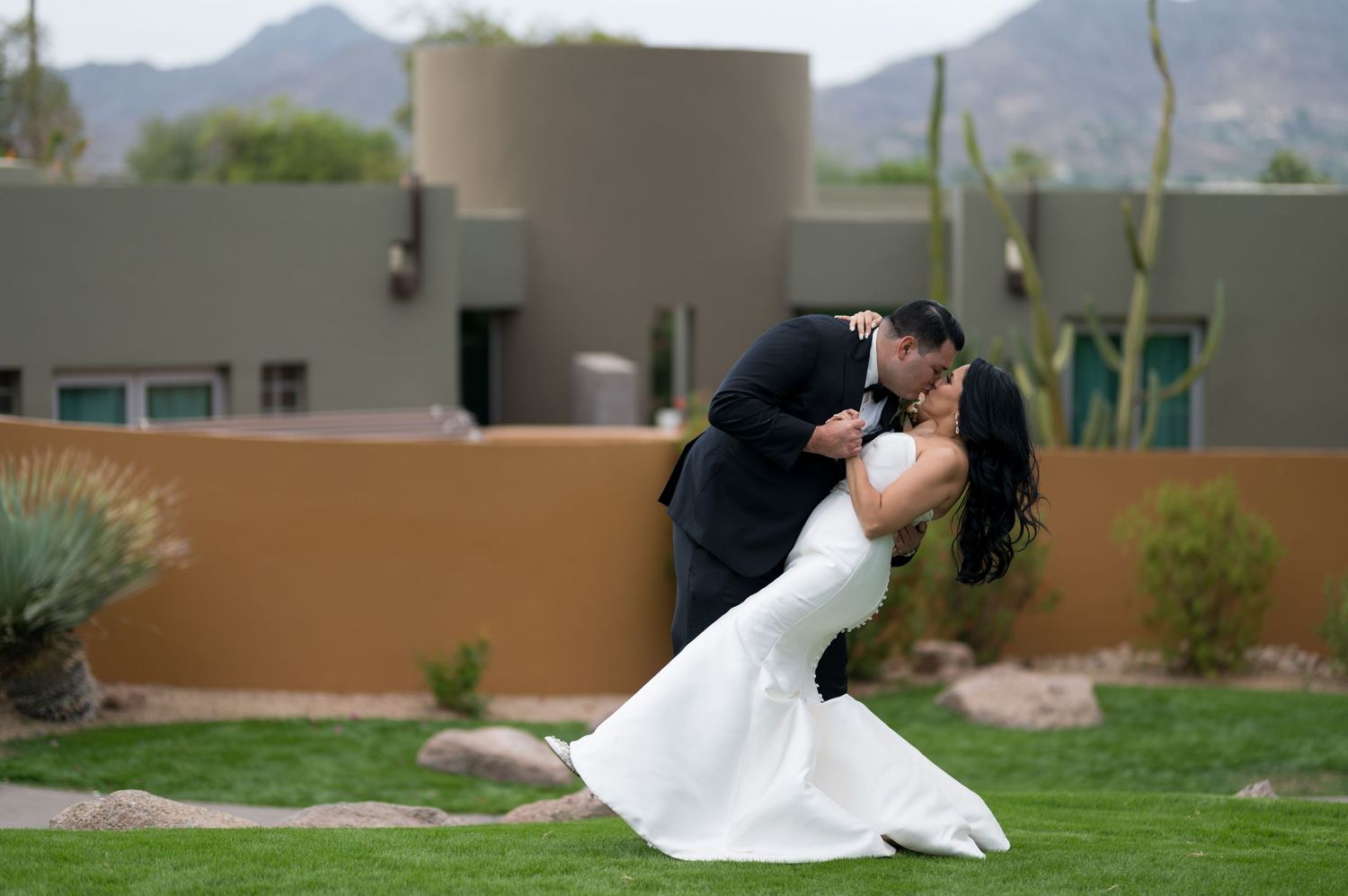 "Sanctuary Camelback Mountain, A Gurney's Resort & Spa: a breathtaking dip kiss moment for the bride and groom.