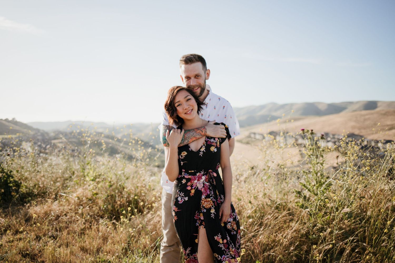 couples engagement photography in open field Bay Area