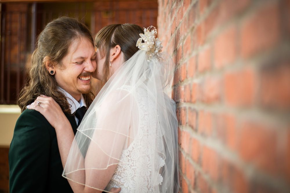 bride and groom close up laughing acton town hall wedding