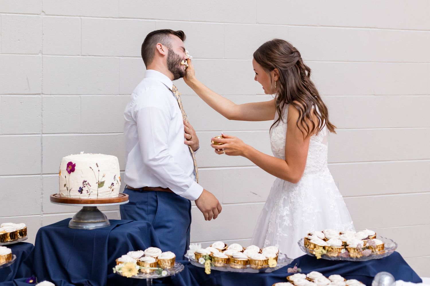 groom kisses bride