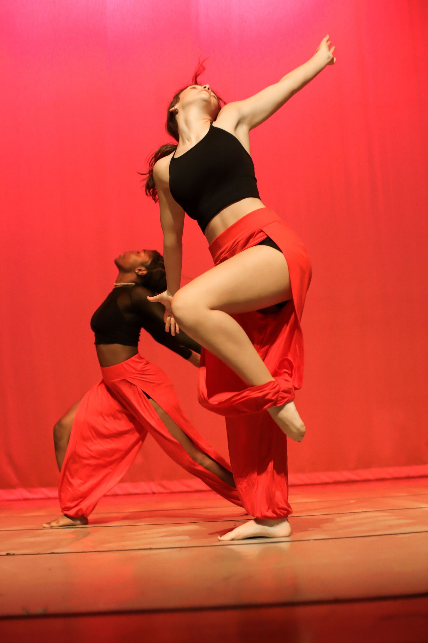 Two girls performing at a dance concert