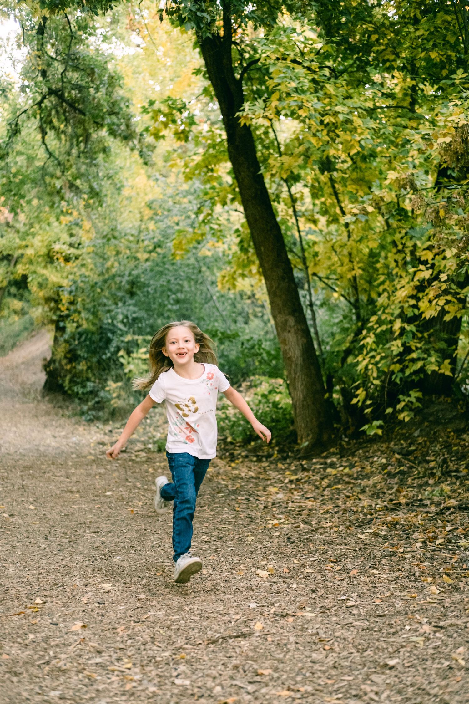 Mary running at Gaily trail Nichols park near Farmington and Layton Utah in Davis County.
