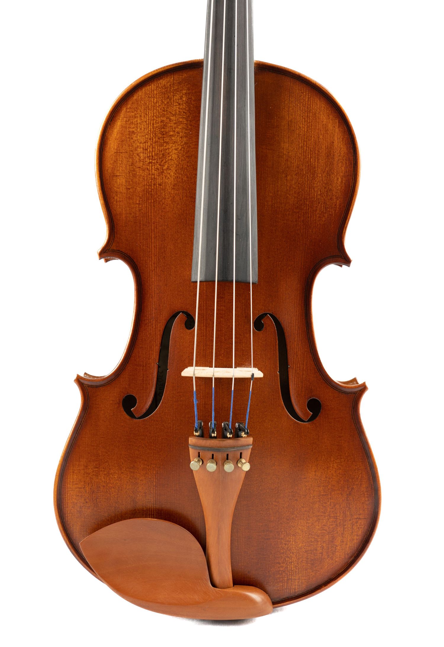 Front view of a polished wooden violin showing f-holes and bridge against white background.