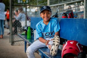 baseball player in dugout