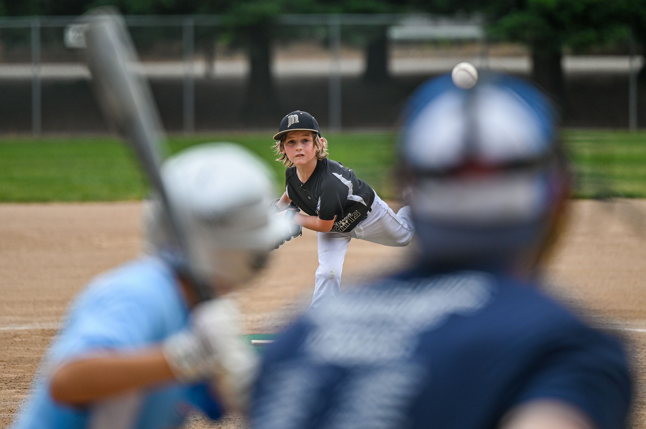Baseball pitcher pitching