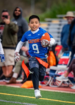 Flag football players.