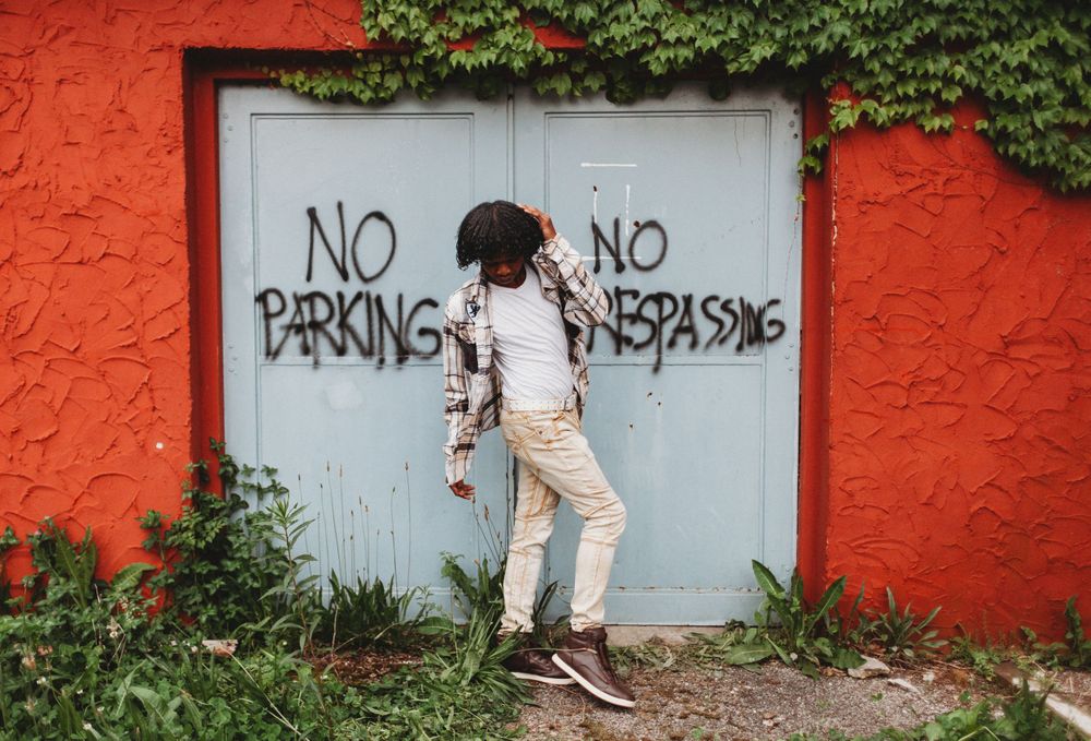 model poses by wall