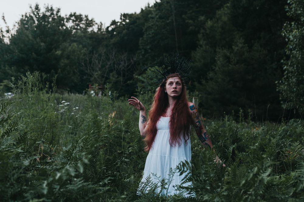 model poses in field