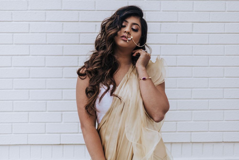 model poses in traditional wear