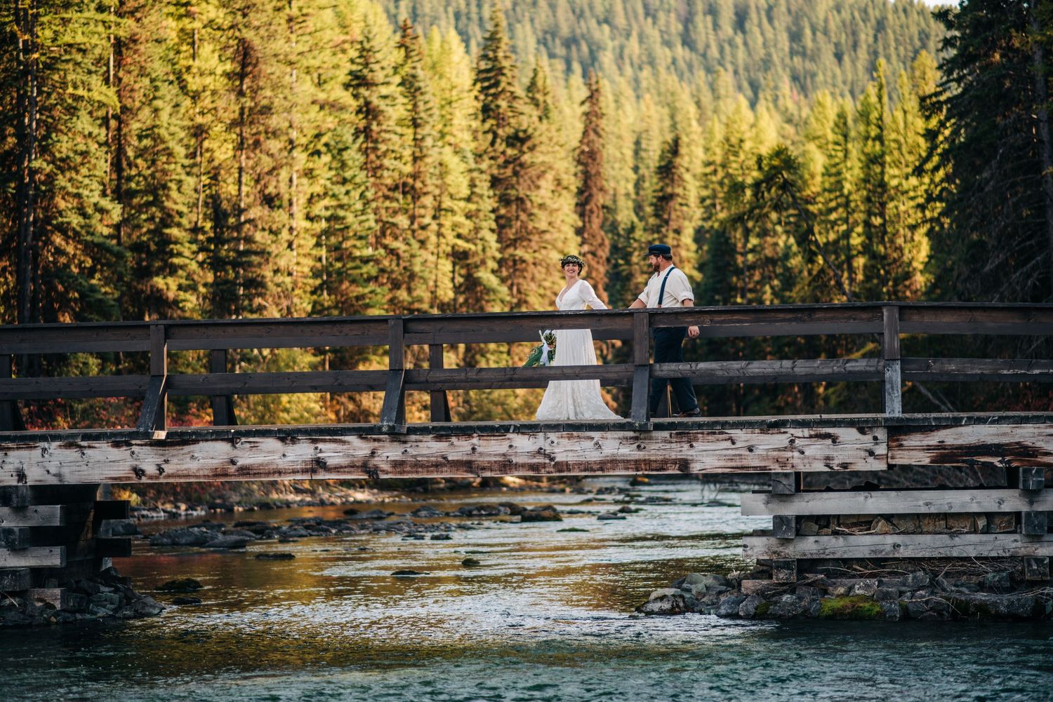 couple getting married at bowman Lake in glacier national park