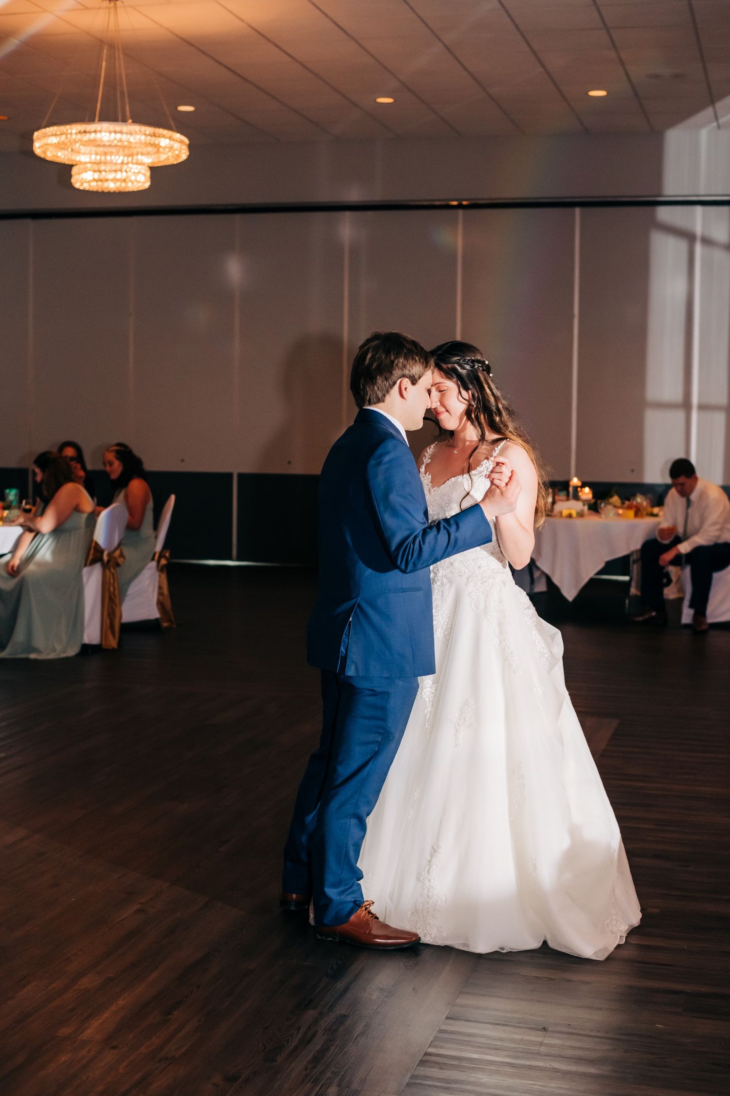 bride and groom's first dance at their wedding reception