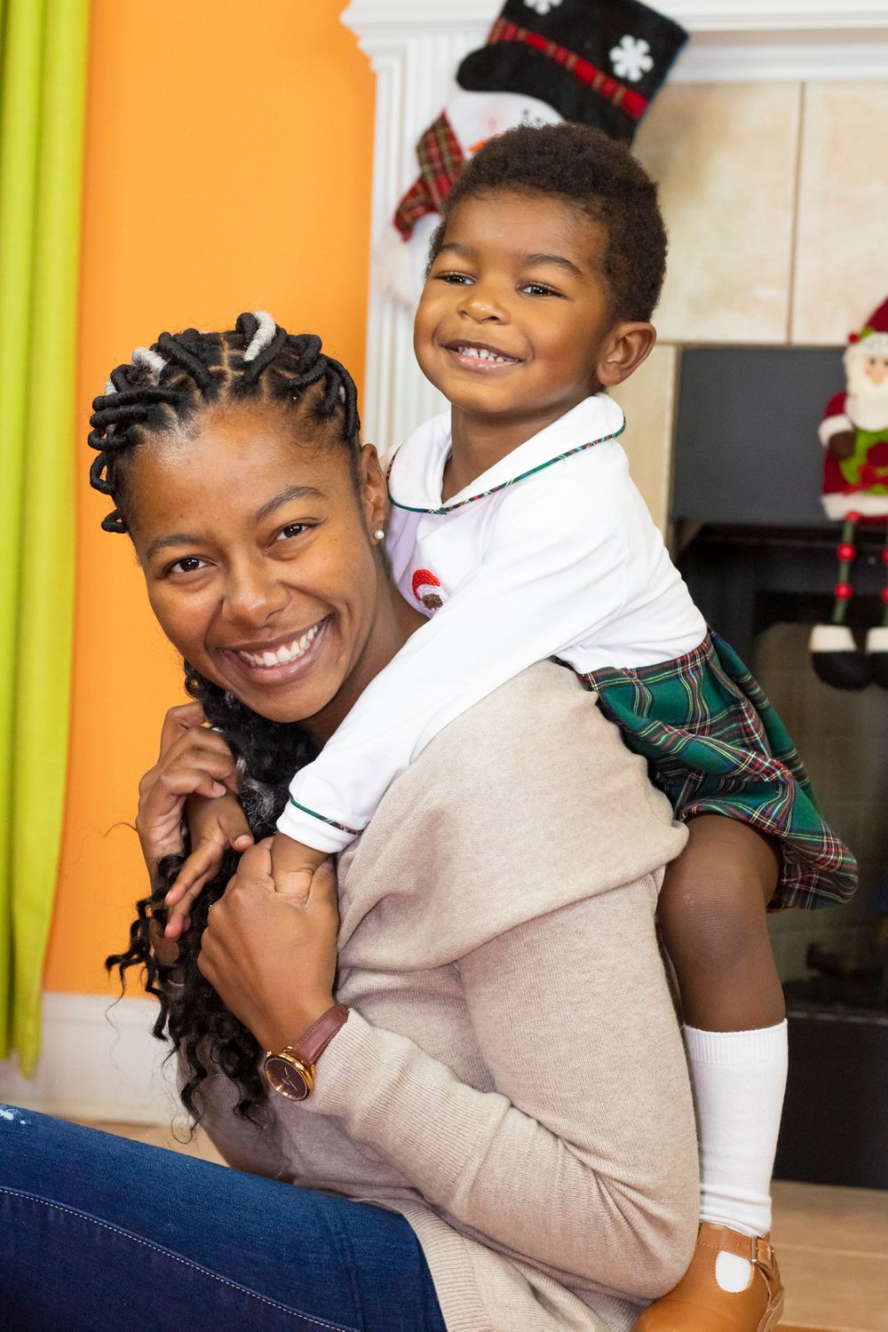 A child leaning on their mothers back.