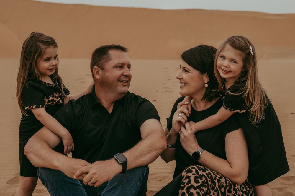 Family together at the Swakopmund dunes during their family photoshoot
