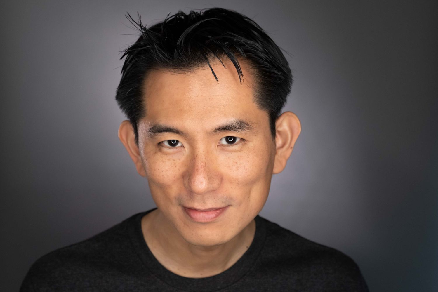 Professional headshot photo of a man